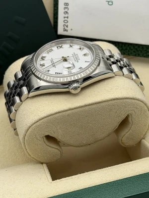 Rolex Datejust 36 16220 white roman, engine turned bezel, oyster bracelet, 2004