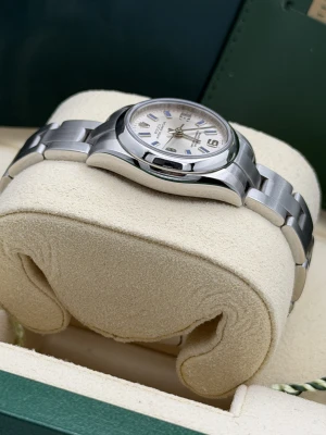 Rolex Oyster Perpetual 26mm 176200 silver baton dial 2009